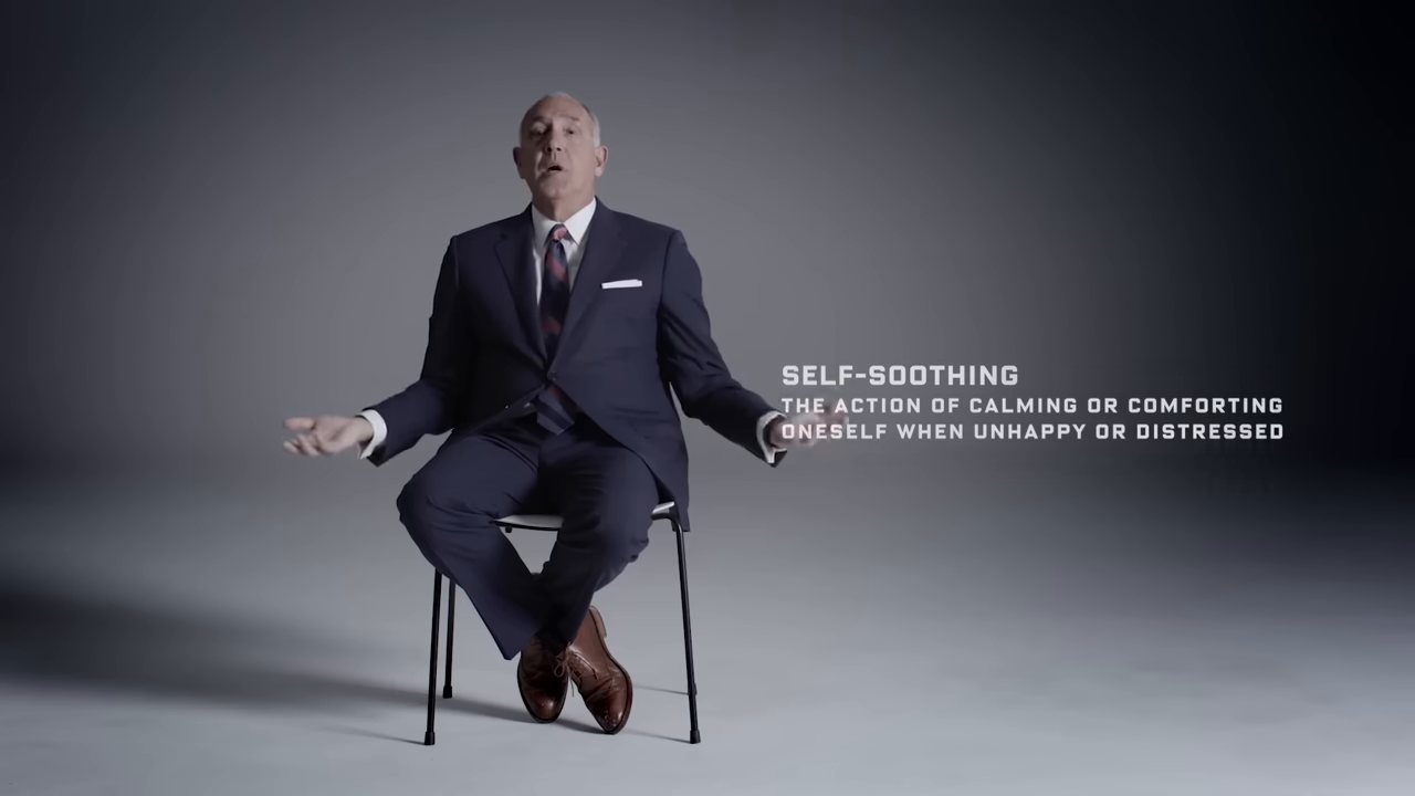 [01:32] On-screen  defines "SELF-SOOTHING" as "The action of calming or comforting oneself when unhappy or distressed." —