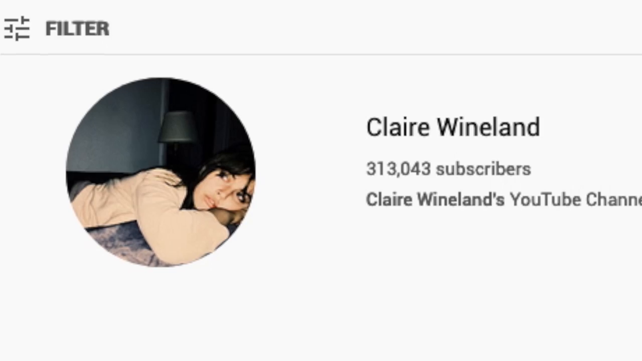 [06:54] : A screen recording of the YouTube homepage for the channel "Claire Wineland," clearly showing her profile picture and a subscriber count of 313,043.