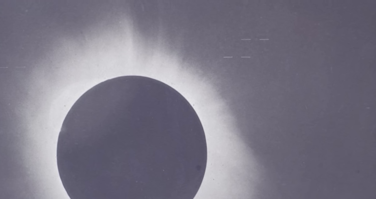 A  illustrating how the sun's gravity bends starlight, shifting the star's apparent position from Earth.